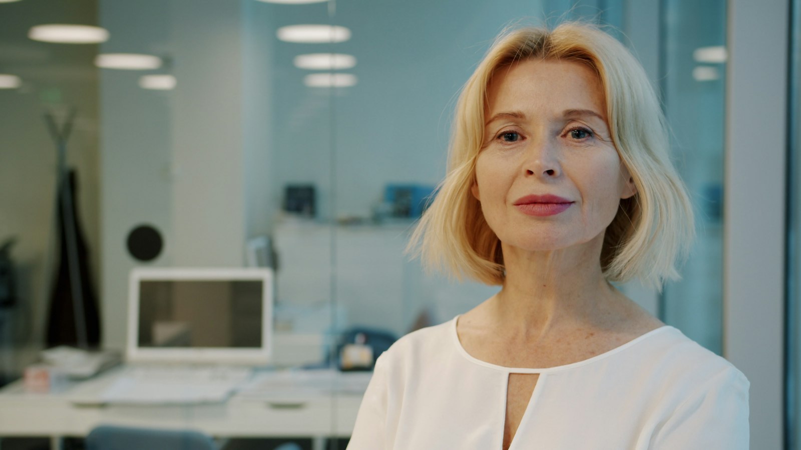 An experienced professional in a modern office
